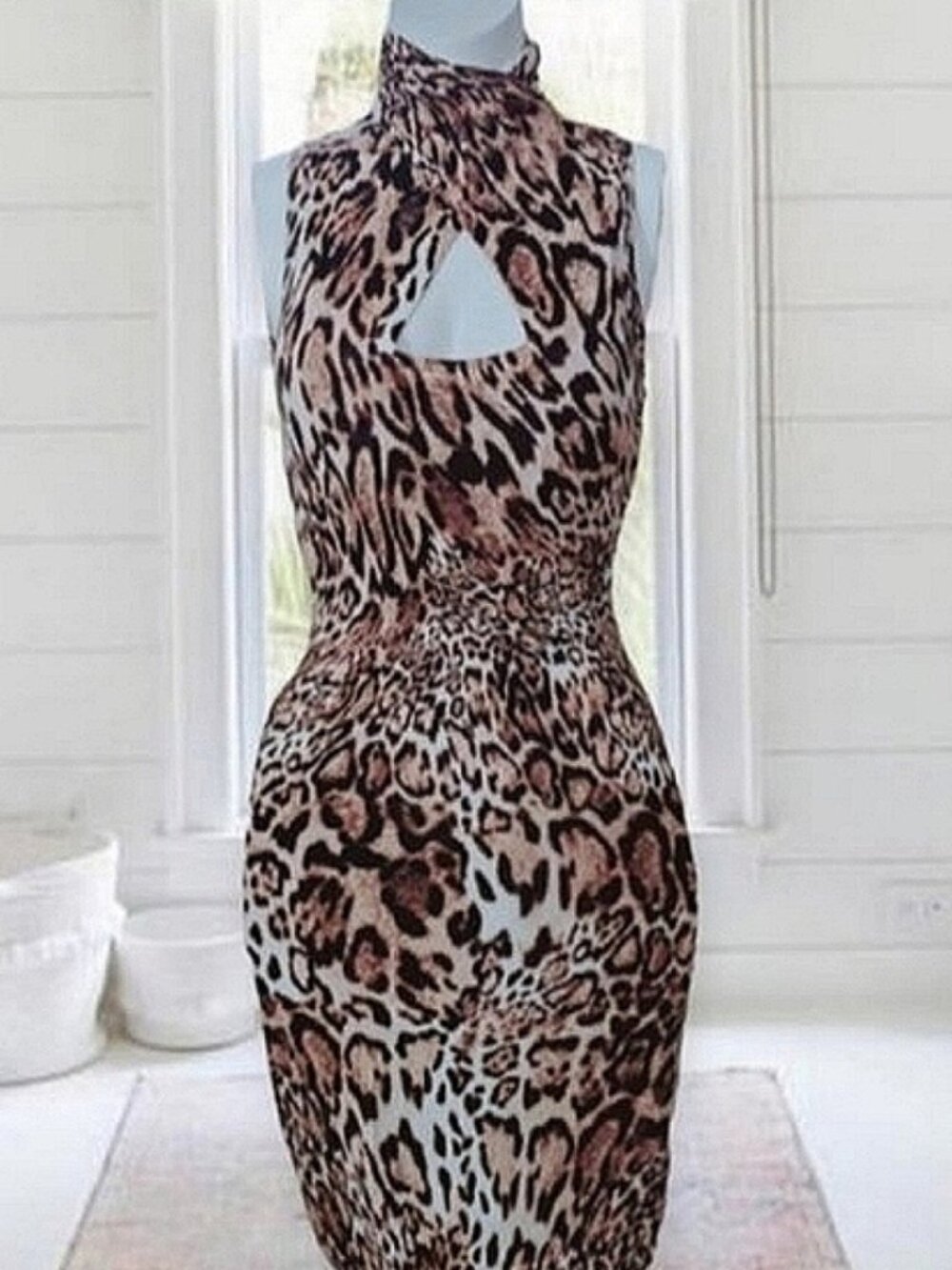 BEBE- Cutout Keyhole Mock Turtle Neck Animal Print Dress
